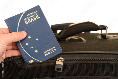 Brazilian passport being prepared for travel. Important document for trips abroad. photo