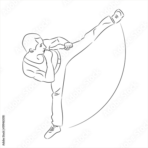 Silhouette of a karateka doing standing side kick .