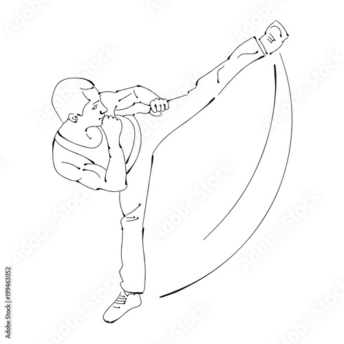 Silhouette of a karateka doing standing side kick .