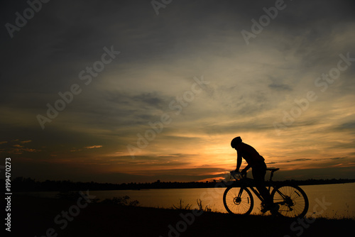 Wallpaper Mural Silhouette of cyclists at sunset.,thailand people Torontodigital.ca