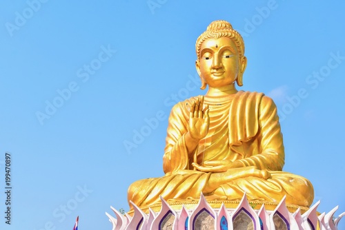 Golden Buddha Statue at Wat Samphran in Thailand