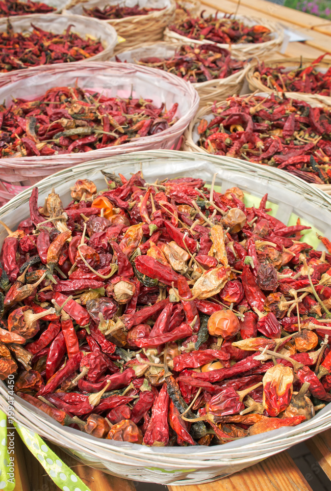 Dried Chili Peppers in basket with copy space Dried Chili Peppers in basket with copy space