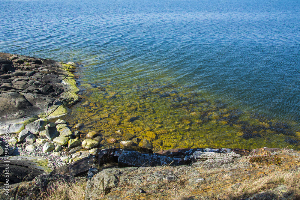 Rocky shore and clear water of Gulf of Finland, Finland