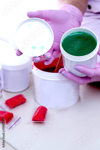 Jars with cosmetics and pasta for shugaring photo