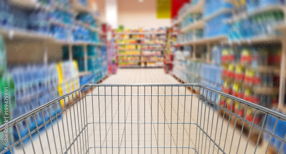 Speeding mall aisle with shopping cart Speeding mall aisle with shopping cart