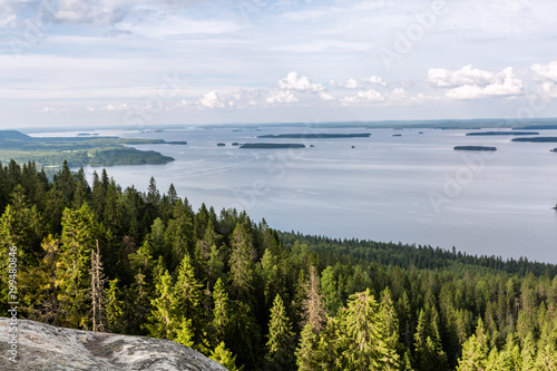 View of the big beautiful lake and forest from hill top, Koli National Park, Finland photo