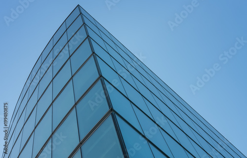 Glass facade, modern architecture with blue sky, morning shoot