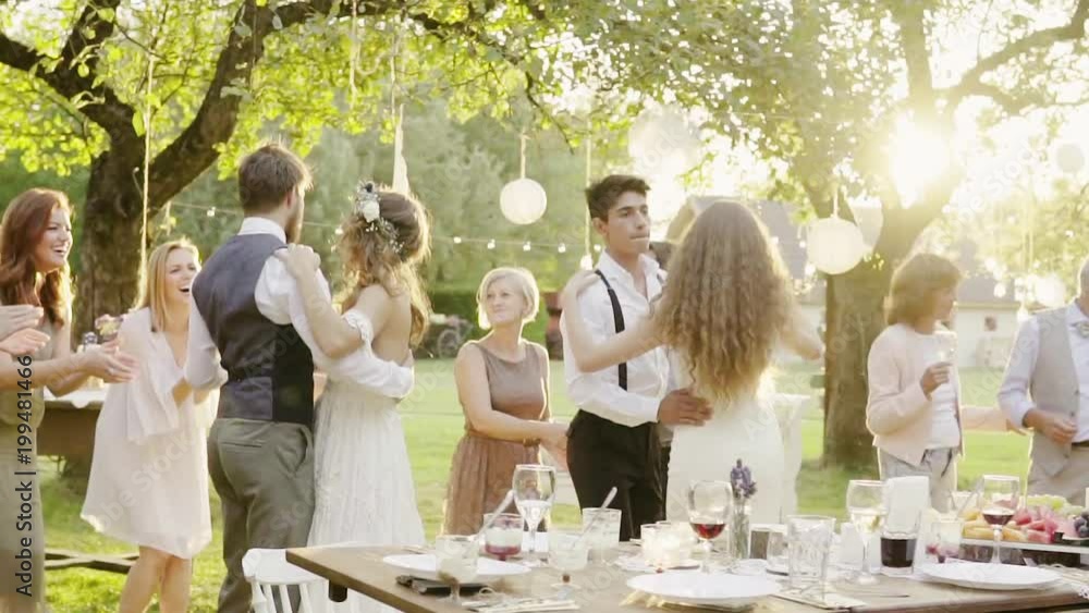 Wedding reception outside in the backyard. Wedding reception outside in the backyard.