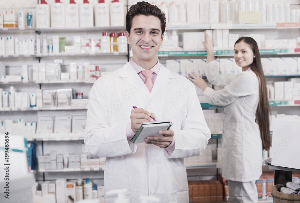 © JackF - Young team in chemist shop