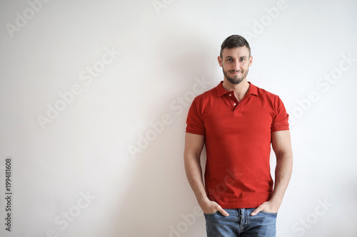 Young man in red polo shirt