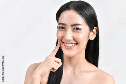 The concept of healthy beautiful woman. Beautiful women keep healthy. Beautiful women take care of skin health. Beautiful girl on white background