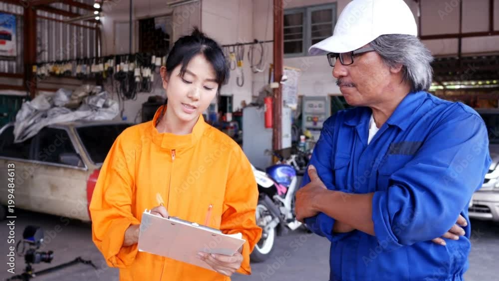 Mechanic people working at garage together . people with car service, repair and maintenance concept. Mechanic people working at garage together . people with car service, repair and maintenance concept.
