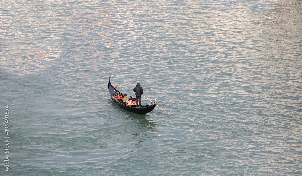 Fototapeta premium lonely gondolier in Venice