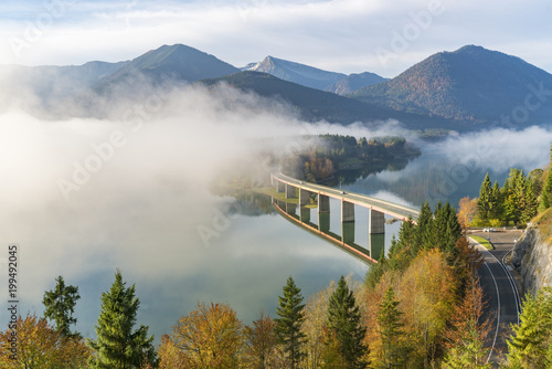 Sylvenstein Lake and bridge surrounded by the morning mist, Bad Tolz-Wolfratshausen district, Bavaria, Germany photo