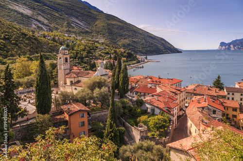 Panoramic view of Lake Garda, Chiesa di S. Andrea and the port of Torbole, Lake Garda, Province of Trento, Italian Lakes
