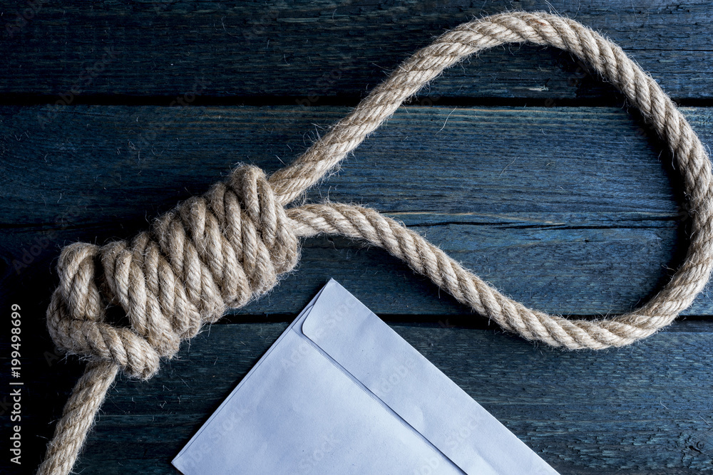 Fototapeta premium Hangman noose with letter of suicide