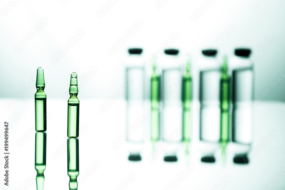 Group object of liquid medicinal agent in limpid glassware in medical laboratory Group object of liquid medicinal agent in limpid glassware in medical laboratory