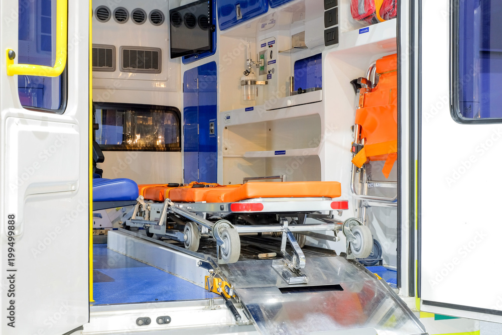 Inside an ambulance with medical equipment for helping patients before delivery to the hospital. Inside an ambulance with medical equipment for helping patients before delivery to the hospital.