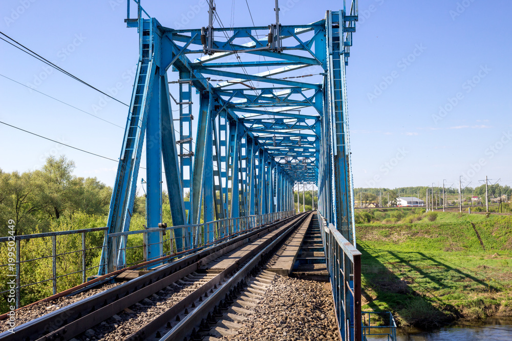Construction of a metal railway bridge
