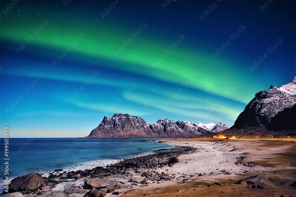 Nothern lights above the beach in Utakleiv Nothern lights above the beach in Utakleiv