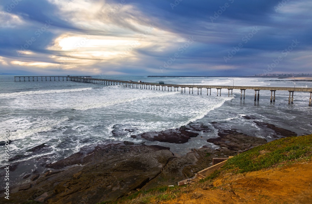 Ocean Beach Pier and Dramatic Pacific Sunset Sky in San Diego California USA