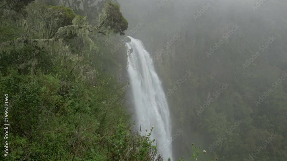 Waterfall on a misty day Waterfall on a misty day