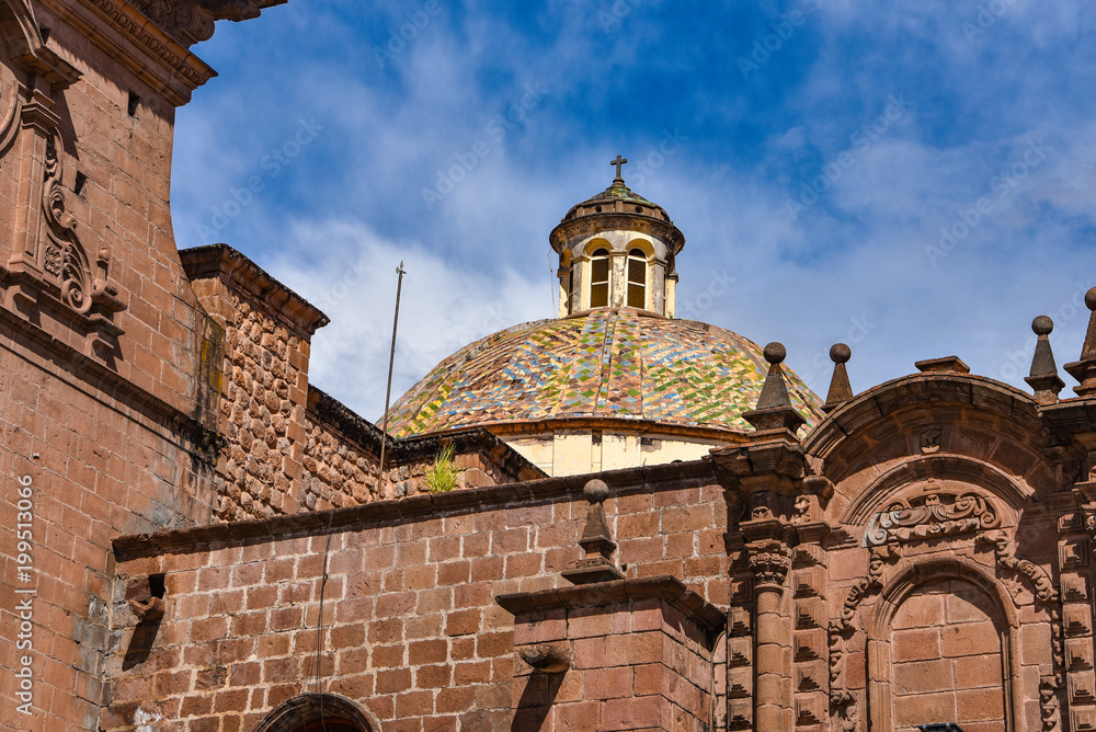 The domed Basilica of the Iglesia de la Compania de Jesus, a Jesuit church in the main square of Cusco, Peru