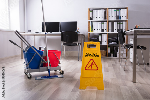 Fotografie Wet Floor Caution Sign On Floor