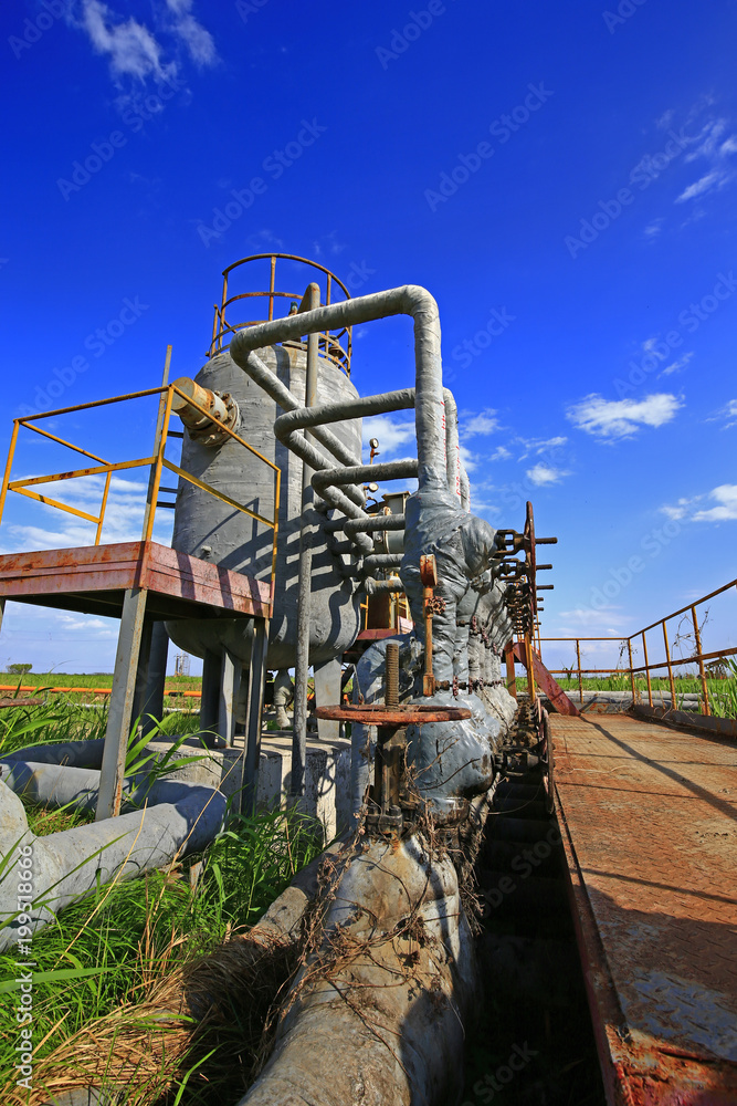 Naklejka premium Oil pipes and valves