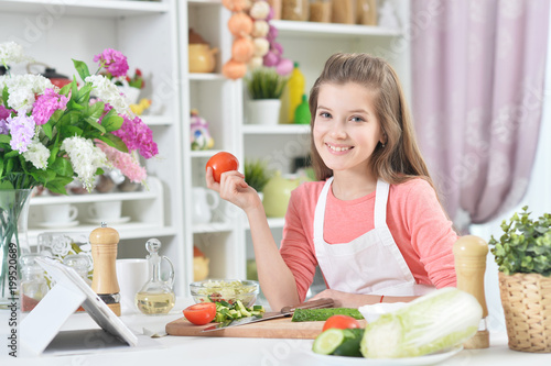 Attractive young girl cooking