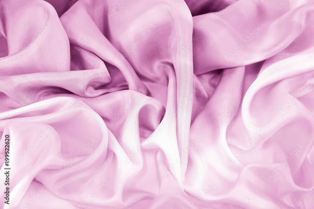 Obraz premium The texture of the satin fabric of lilac color for the background 