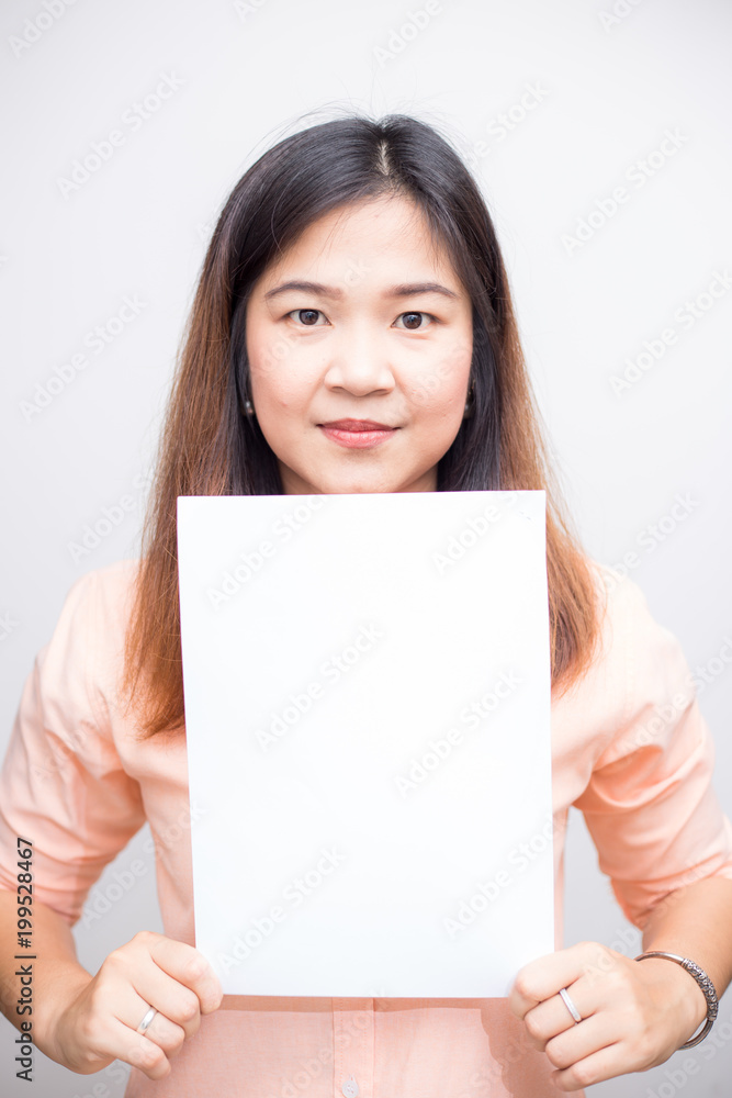 Beautiful women hold white paper for advertising Beautiful women hold white paper for advertising