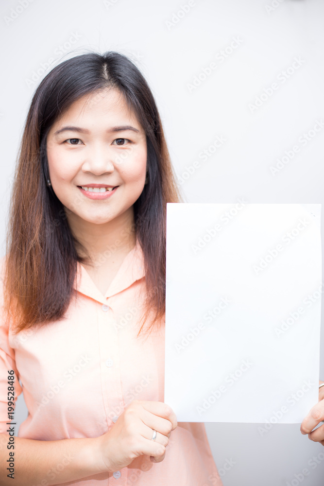 Beautiful women hold white paper for advertising Beautiful women hold white paper for advertising
