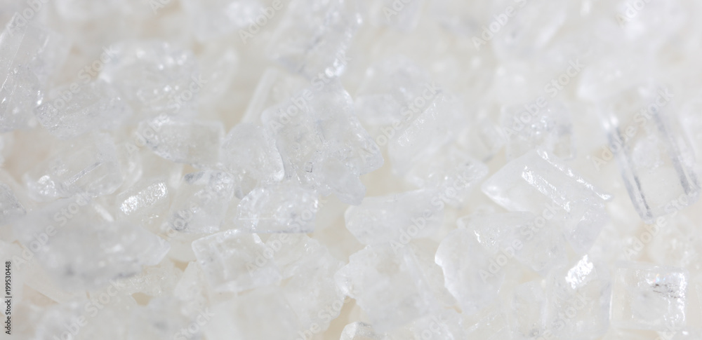 White granulated sugar as a background White granulated sugar as a background