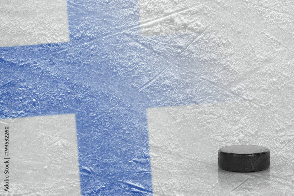 Naklejka premium Hockey puck and the image of the Finnish flag on the ice