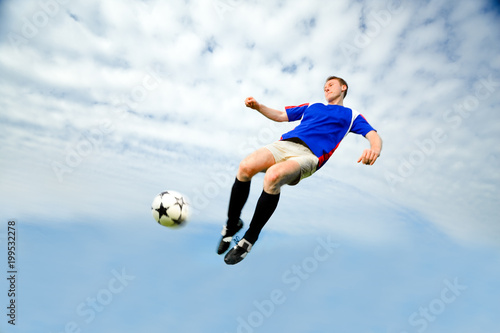 Man playing Soccer © nullplus