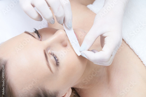 Cosmetic procedure for hair removal. Bright skin. Beauty and health