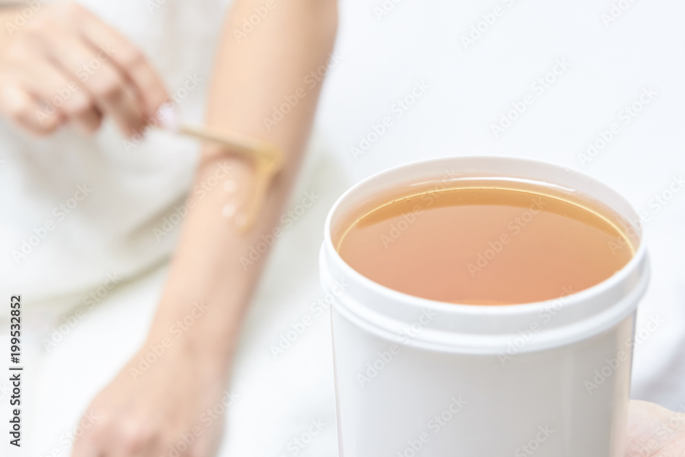 Procedure for hair removal. Beauty and health. Bright skin. White background Procedure for hair removal. Beauty and health. Bright skin. White background