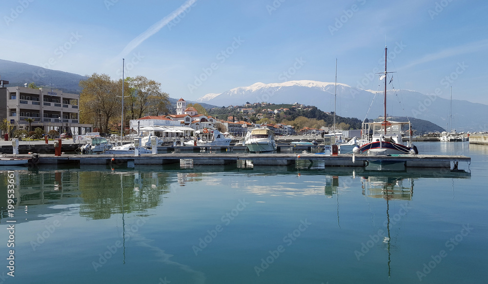 PLATAMONAS, GREECE - APRIL 3, 2018: Beautiful view of boats in the harbour of Platamonas, Greece