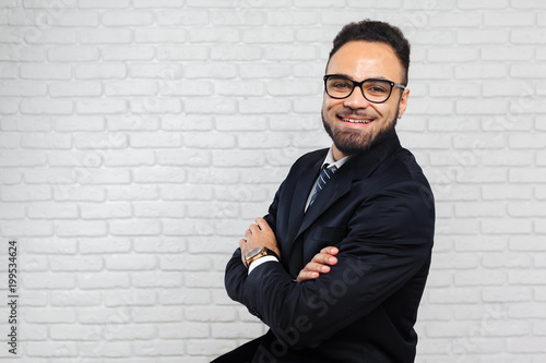 Handsome cheerful african american executive business man