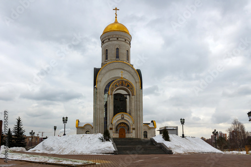 Snow-covered church of St. Great Martyr George the Victorious on Poklonnaya Hill in Moscow