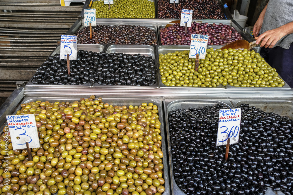 Containers with Greek green olives in the market, Athens, Greece.