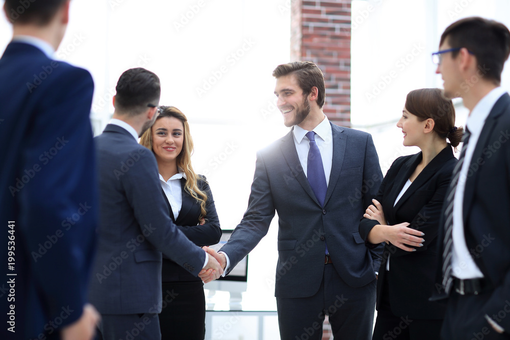 business handshake of businessmen in the office business handshake of businessmen in the office