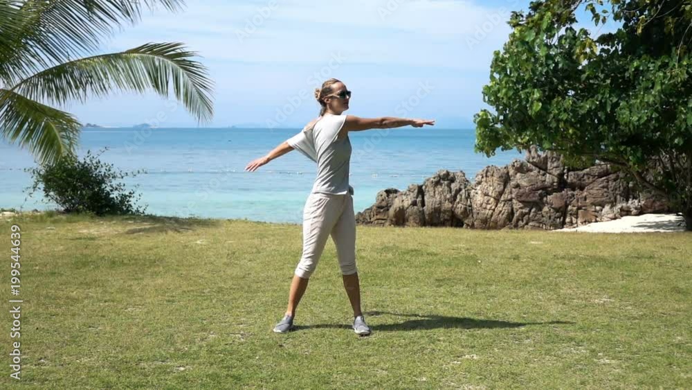 Young, sporty woman stretching body, doing warmup in garden, super slow motion 240fps
Young, sporty woman stretching body, doing warmup in garden, super slow motion 240fps