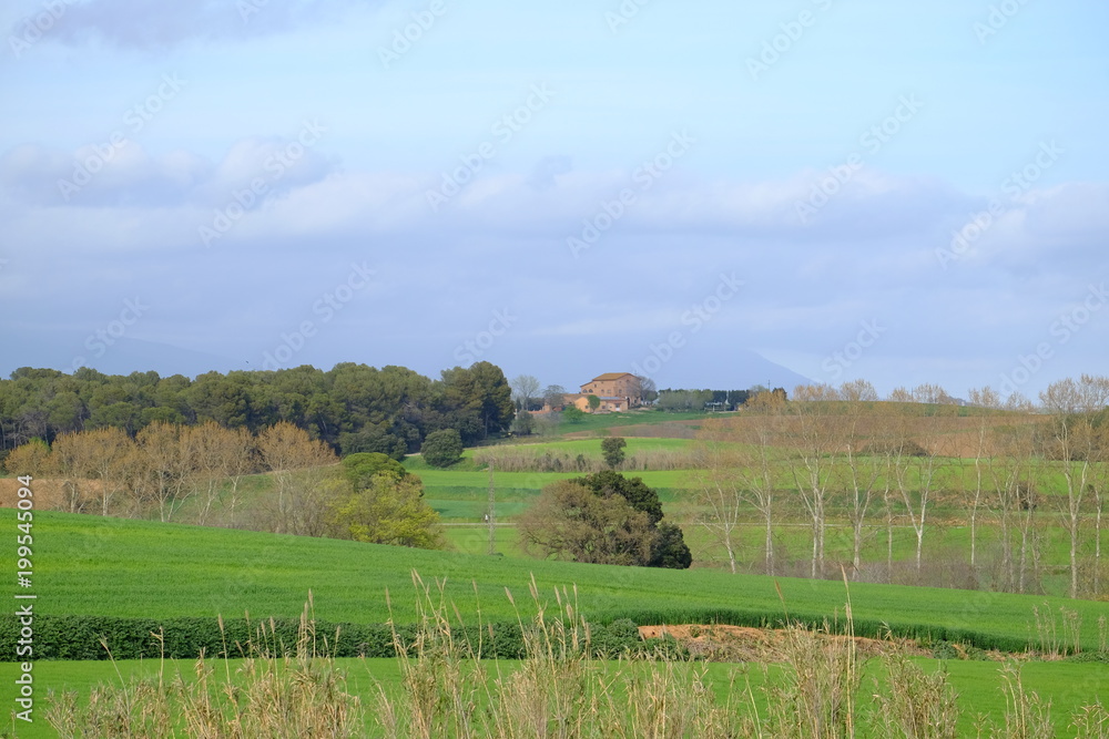 Obraz premium Greenfield and hill in Mollet del Valles in Barcelona province in Catalonia Spain