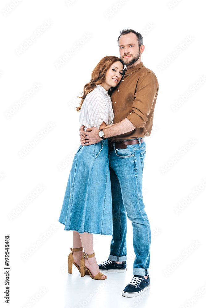 full length view of beautiful happy couple hugging and smiling at camera isolated on white full length view of beautiful happy couple hugging and smiling at camera isolated on white