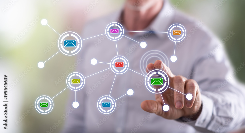 Man touching a communication network on a touch screen Man touching a communication network on a touch screen