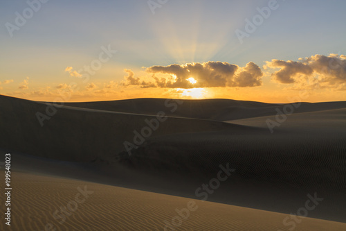 Rippled and smooth sand of dunes of Maspalomas in Gran Canaria.