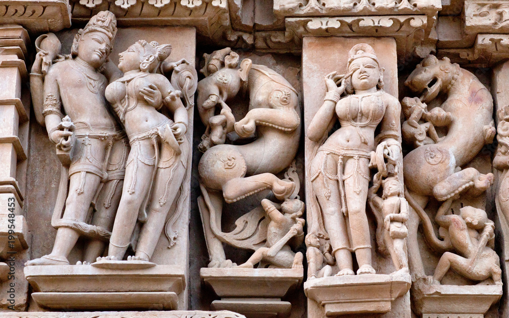 Bas-relief at famous ancient temple in Khajuraho, India