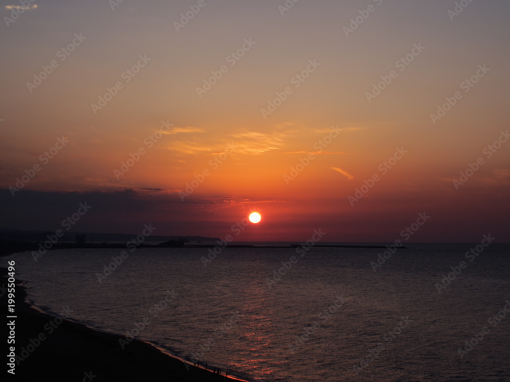 Obraz premium 鳥取砂丘から望む夕日_遠景